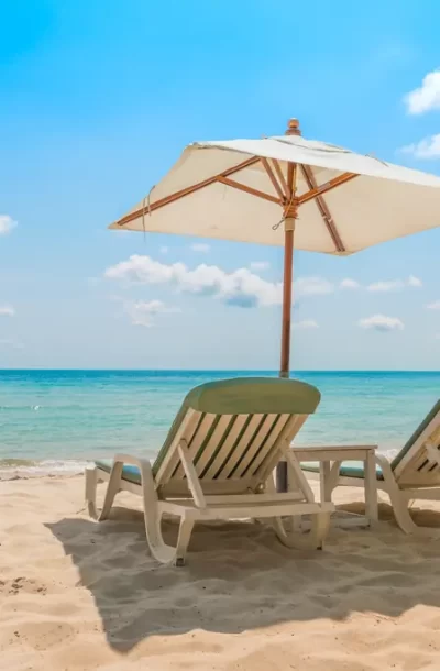 beach-chairs-tropical-white-sand-beach.webp